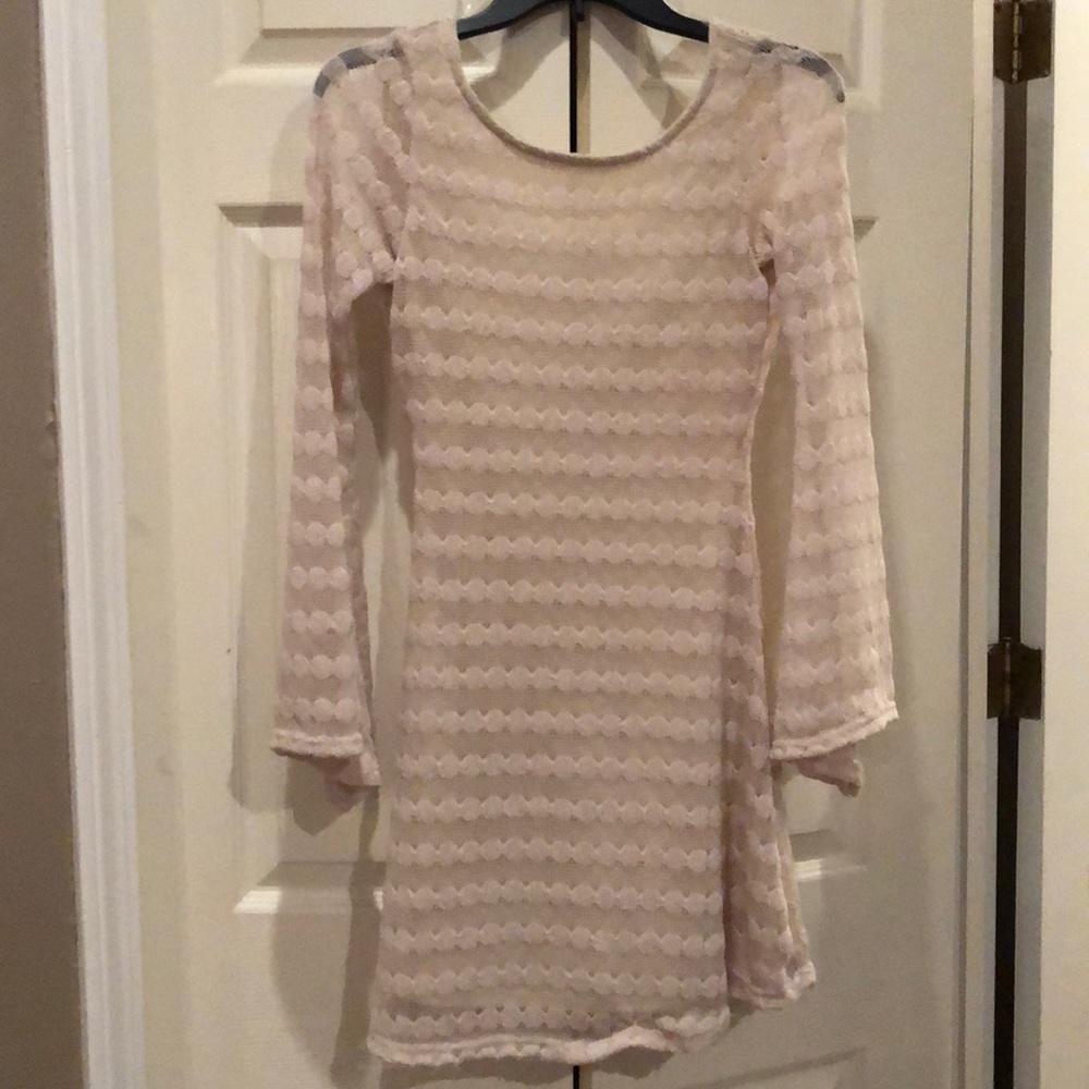 Cream colored women’s dress